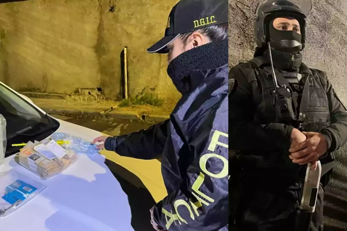 Two police officers examine evidence on the hood of a car during a nighttime operation; one of them is wearing tactical gear and carrying a weapon.