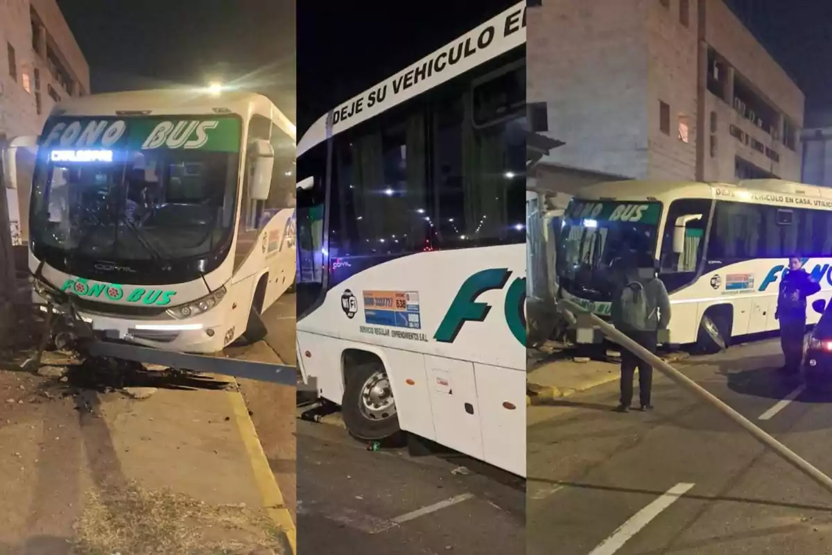 A white Fono Bus company van crashed into a pole on a street at night, with visible damage to the front and people present observing the scene.