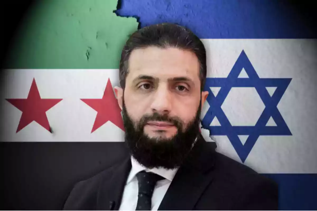 Hombre de barba con traje frente a las banderas de Siria e Israel