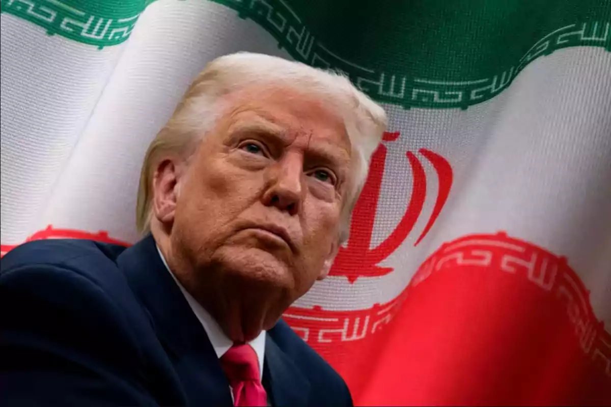 Blond-haired man with a serious expression in front of an Iranian flag