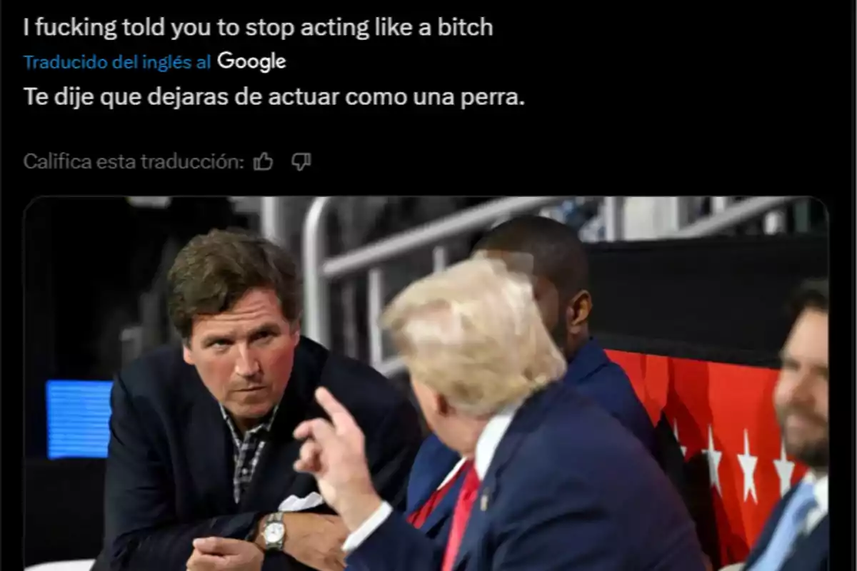 Hombre de cabello rubio hablando y señalando con el dedo a otro hombre que lo observa con expresión seria, acompañados de una traducción automática de una frase en inglés a español en la parte superior de la imagen. Hombre de cabello rubio hablando y señalando con el dedo a otro hombre que lo observa con expresión seria, acompañados de una traducción automática de una frase en inglés a español en la parte superior de la imagen.