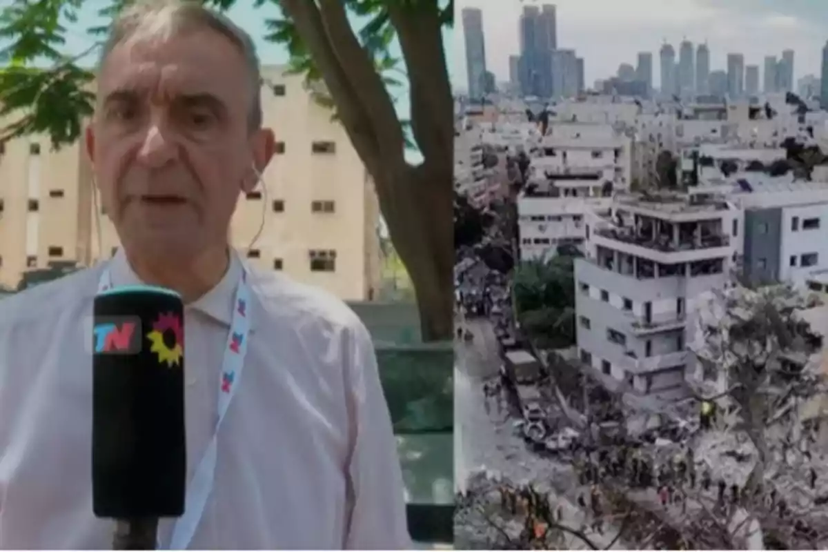 Un periodista sostiene un micrófono de TN mientras informa desde el exterior, al lado de una imagen de edificios dañados en una ciudad.