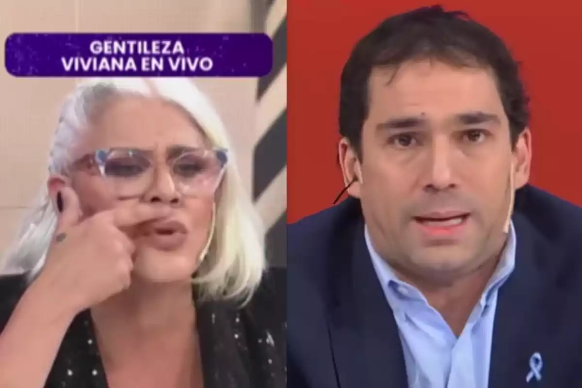 Two people on a TV show, a woman with white hair and large glasses on the left gesturing with her hand, and a man with dark hair and a blue blazer on the right, both wearing lapel microphones. Two people on a TV show, a woman with white hair and large glasses on the left gesturing with her hand, and a man with dark hair and a blue blazer on the right, both wearing lapel microphones.