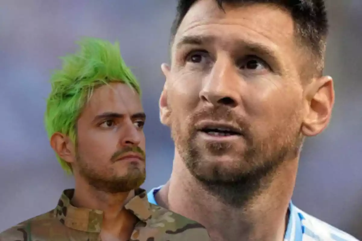 A man with green hair and a camouflage jacket is next to another man with a beard and a light blue and white sports jersey, both looking in different directions.