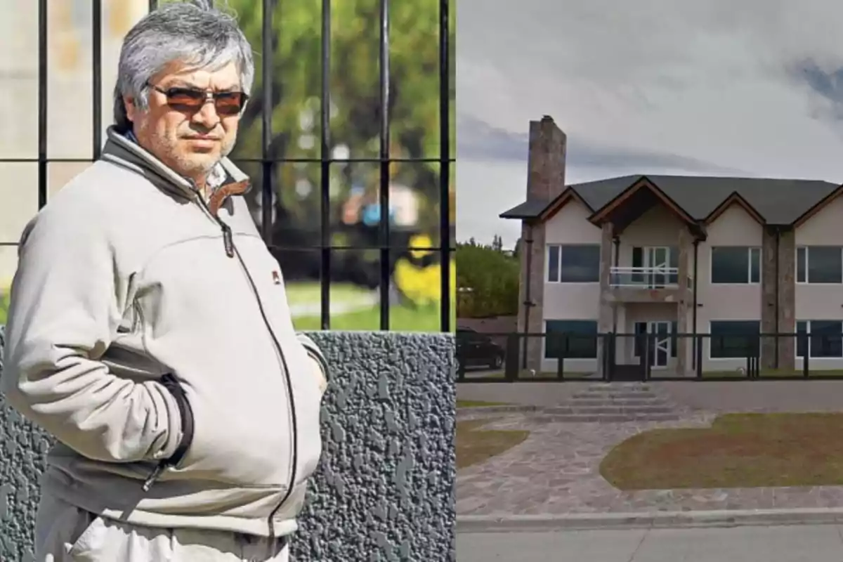 Gray-haired man wearing sunglasses and a light jacket standing next to a fence, beside a large two-story house with a modern facade and a chimney. Gray-haired man wearing sunglasses and a light jacket standing next to a fence, beside a large two-story house with a modern facade and a chimney.