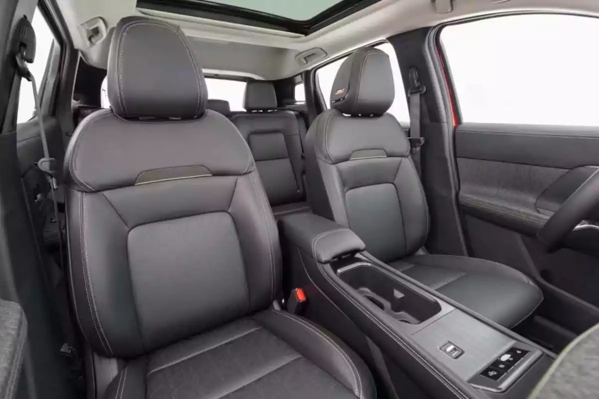 Interior of a modern car with black leather seats and a panoramic roof Interior of a modern car with black leather seats and a panoramic roof