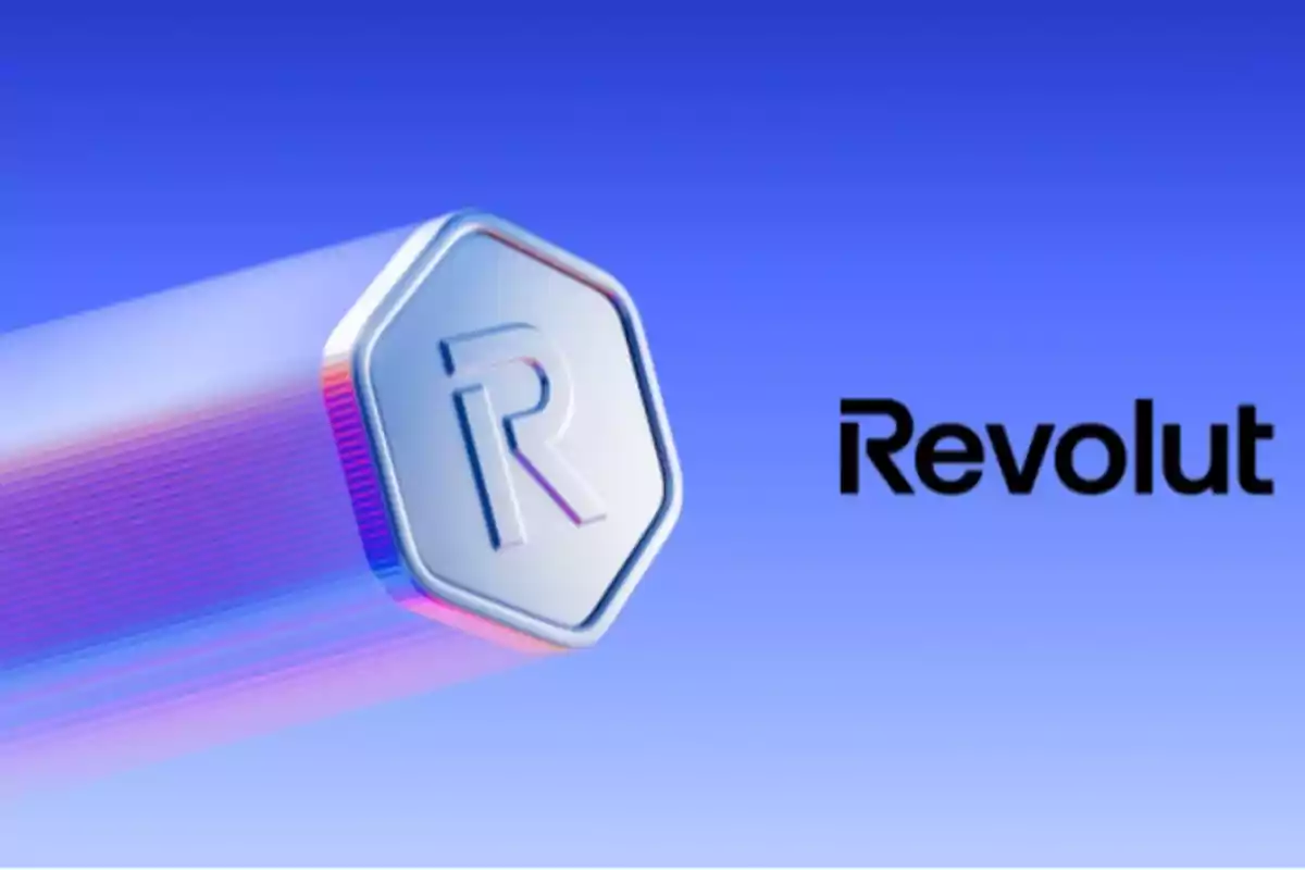 Revolut logo with a blue background and a silver hexagon featuring a raised letter R Revolut logo with a blue background and a silver hexagon featuring a raised letter R