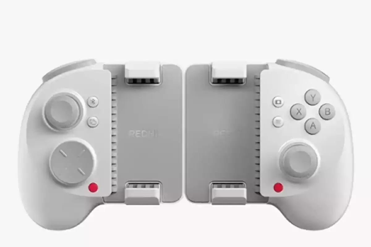 Control inalámbrico blanco y gris para videojuegos con diseño dividido y botones en ambos lados Control inalámbrico blanco y gris para videojuegos con diseño dividido y botones en ambos lados