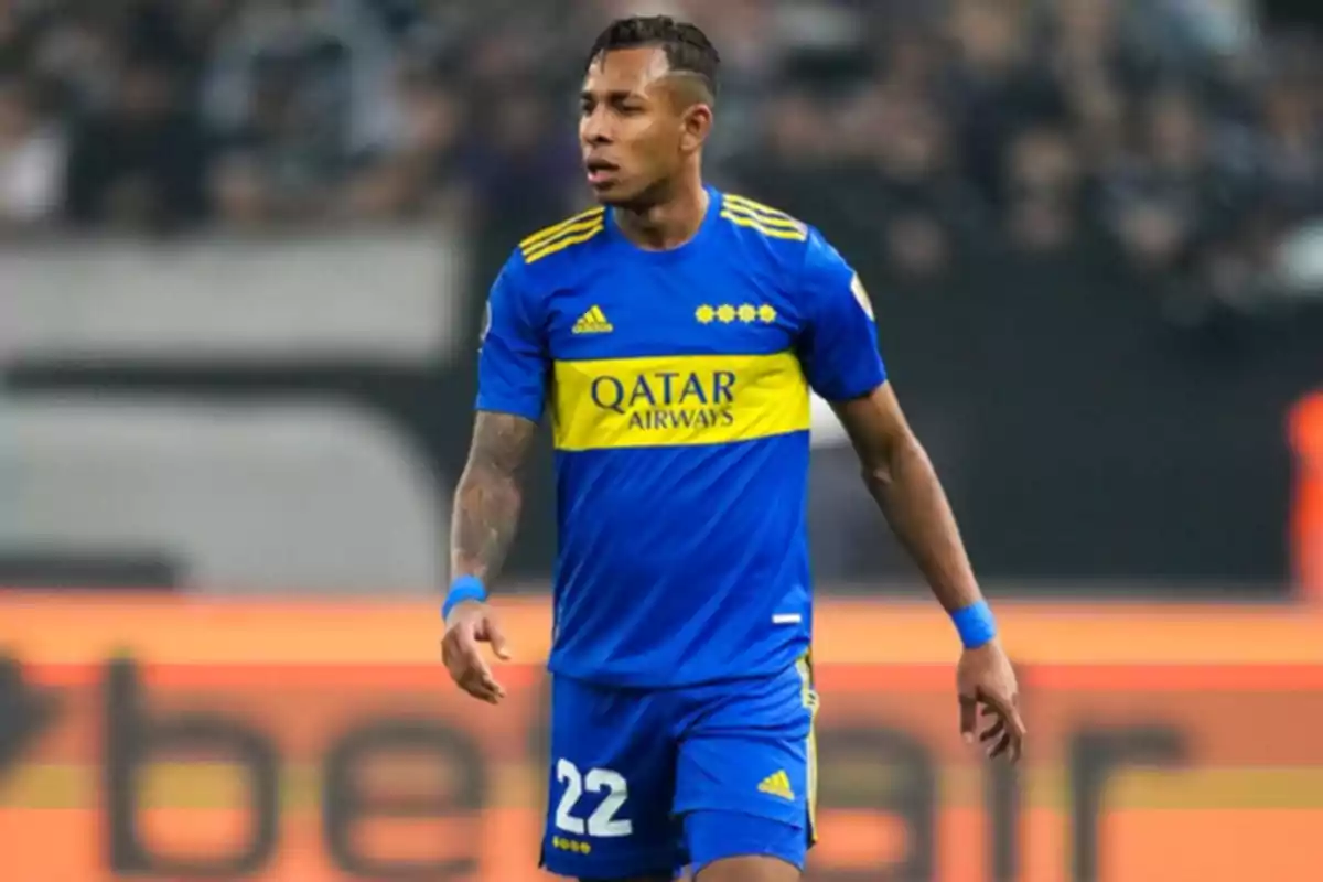 Soccer player wearing Boca Juniors’ blue and yellow uniform on the field during a match