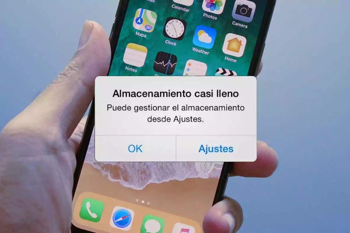 A mobile phone displays a notification indicating that storage is almost full and suggests managing it from the settings. A mobile phone displays a notification indicating that storage is almost full and suggests managing it from the settings.