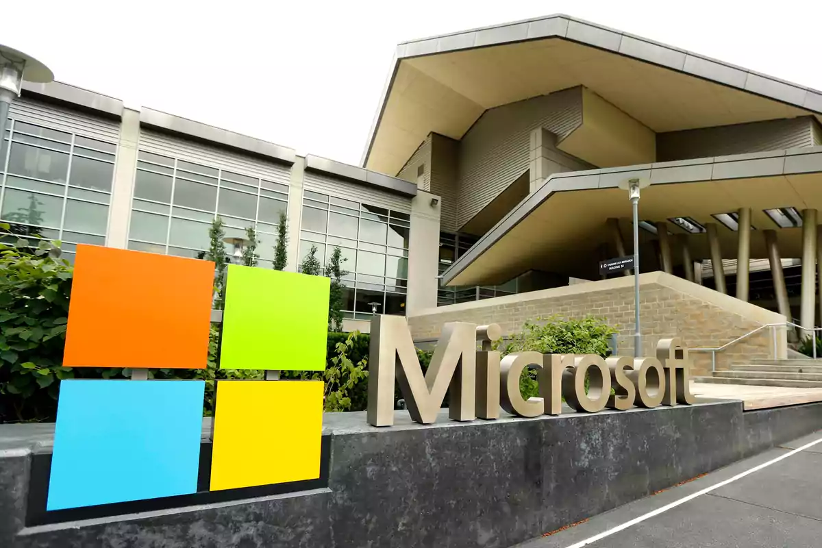Modern building with the Microsoft logo in the foreground Modern building with the Microsoft logo in the foreground