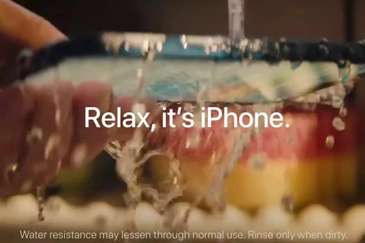 An iPhone being washed under the faucet with the phrase An iPhone being washed under the faucet with the phrase