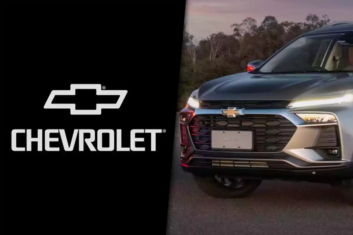 Chevrolet logo next to the front of a pickup truck of the same brand at sunset