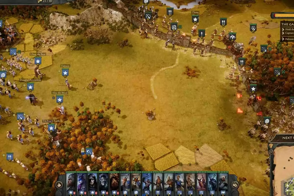 Aerial view of a battlefield in a strategy video game with units lined up and a defensive wall in the background Aerial view of a battlefield in a strategy video game with units lined up and a defensive wall in the background