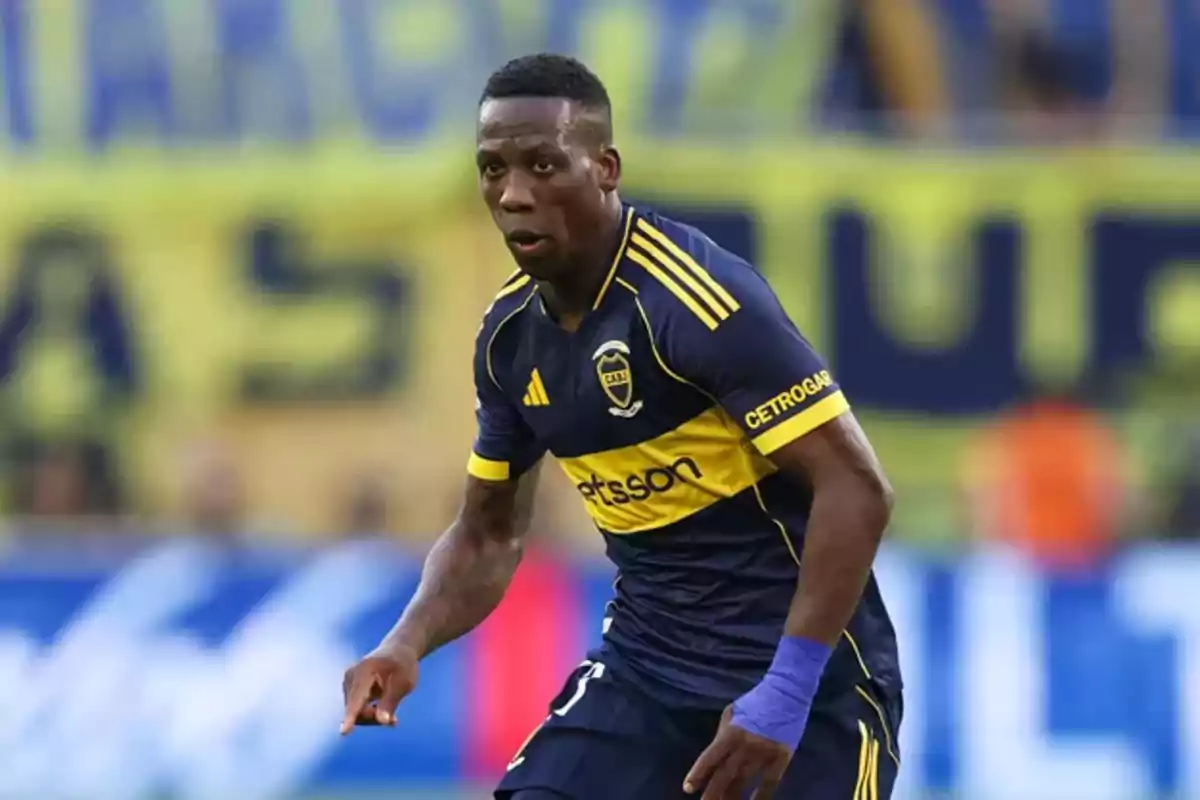 Soccer player in a blue and yellow uniform on the field during a match Soccer player in a blue and yellow uniform on the field during a match