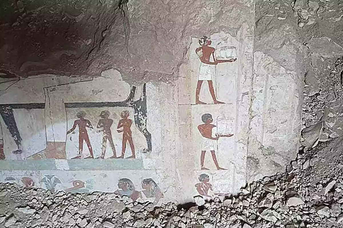 Ancient Egyptian mural painting with human figures in different positions and colors, partially covered by debris and rocks. Ancient Egyptian mural painting with human figures in different positions and colors, partially covered by debris and rocks.
