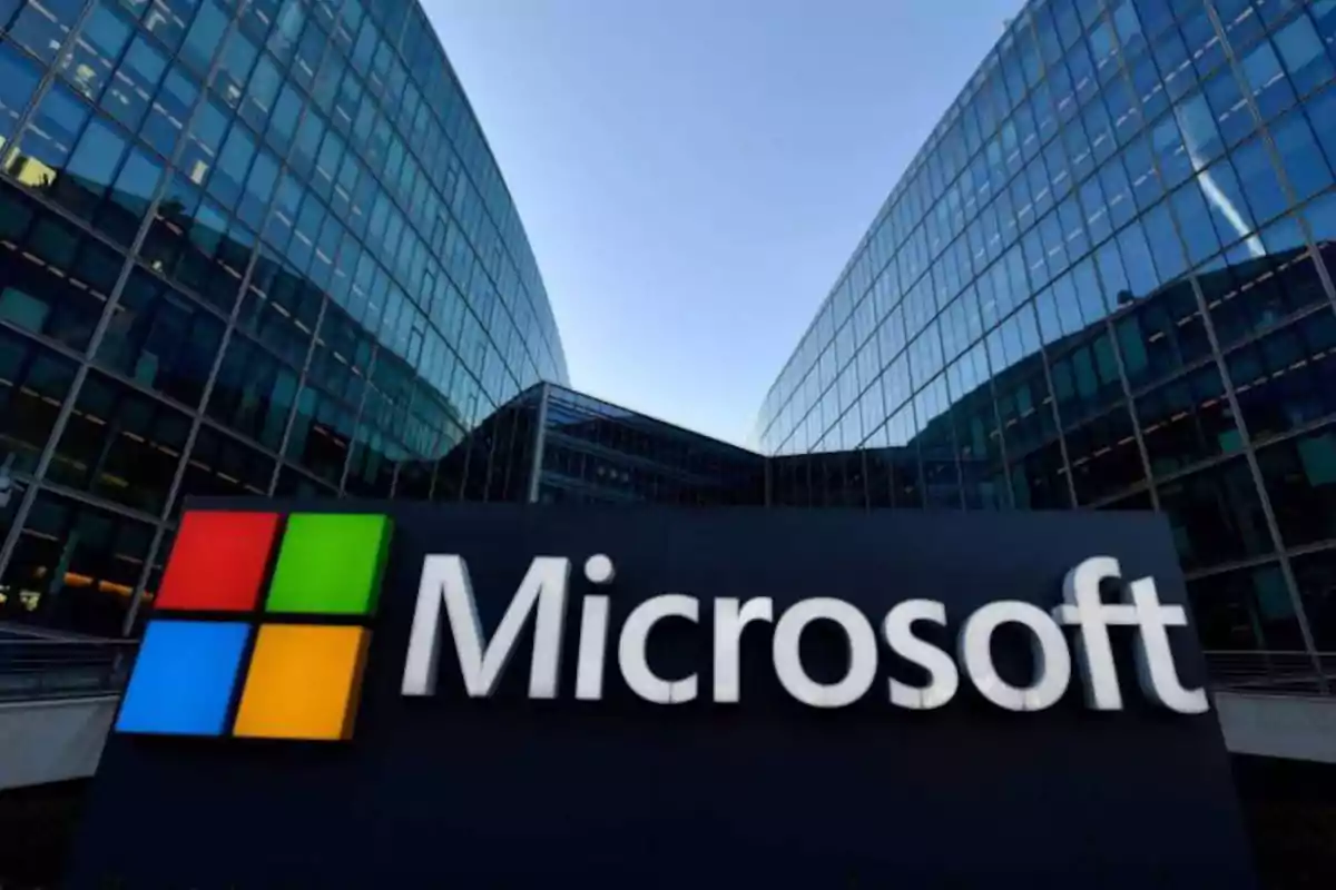 Modern office building with the Microsoft logo in the foreground Modern office building with the Microsoft logo in the foreground