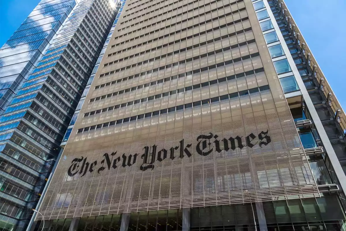 Facade of The New York Times building seen from below on a sunny day