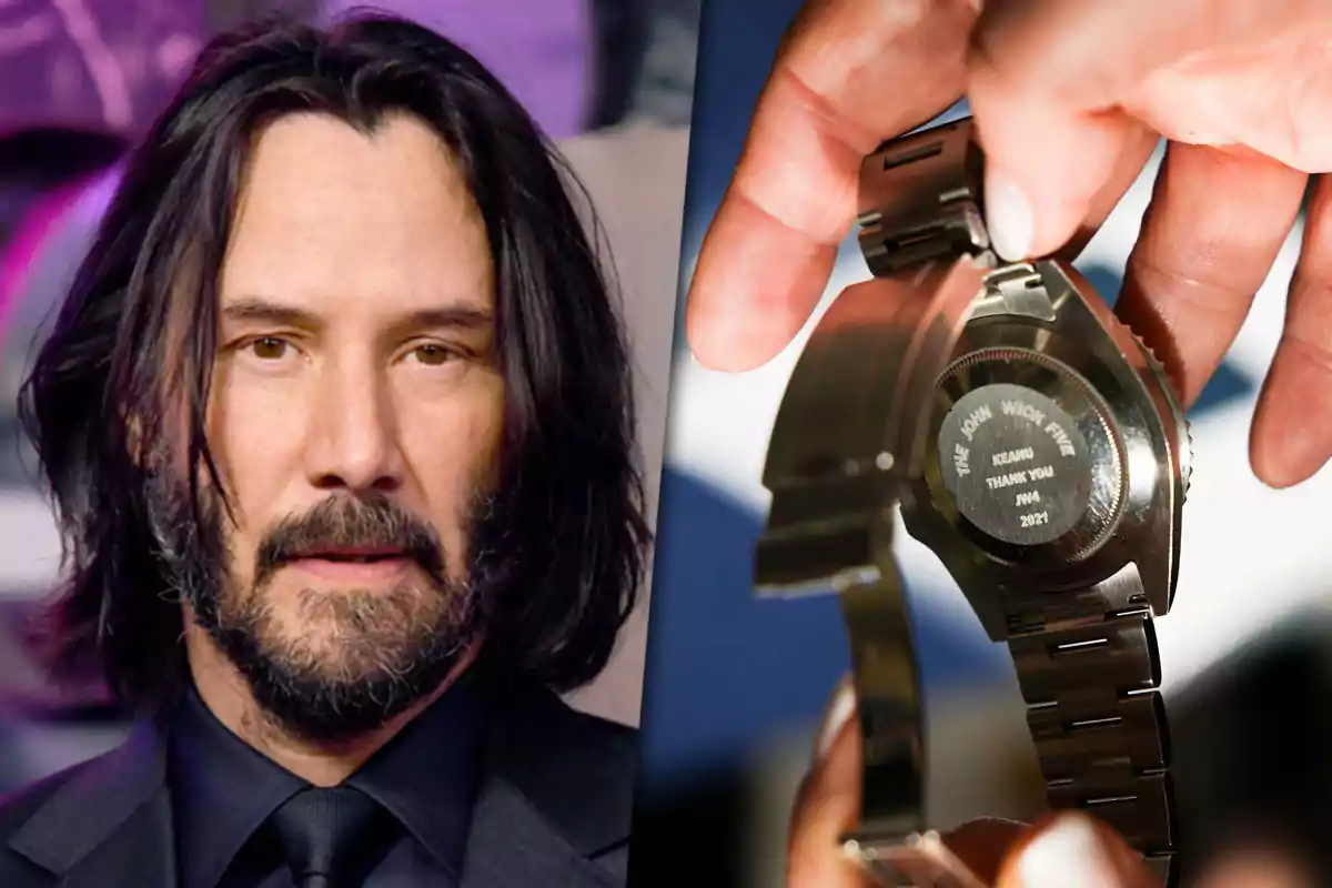 A long-haired, bearded man in a dark suit next to a hand holding a metal watch with an engraving on the back.