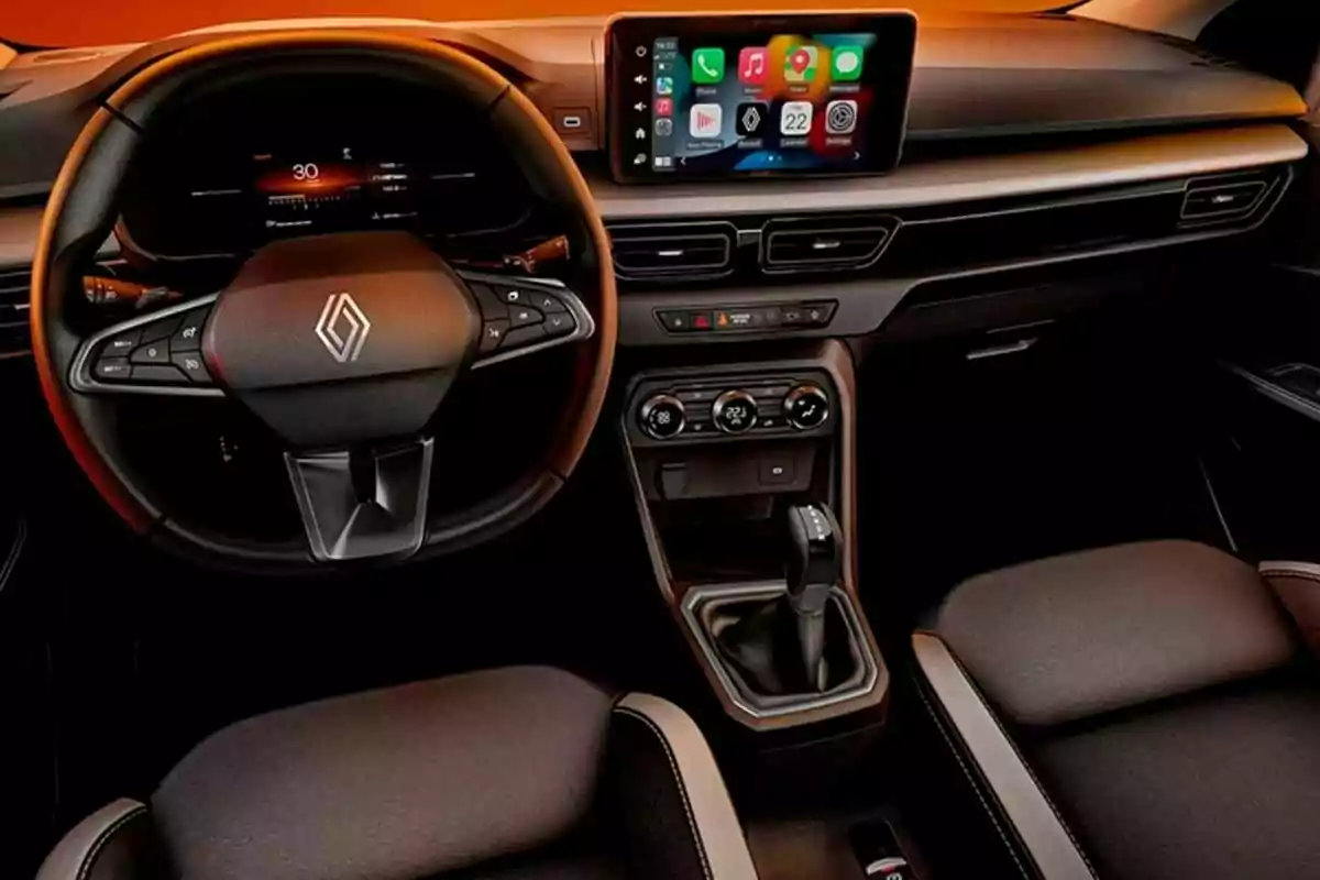 Interior moderno de un automóvil Renault con volante multifunción, pantalla táctil central y controles de clima digitales Interior moderno de un automóvil Renault con volante multifunción, pantalla táctil central y controles de clima digitales