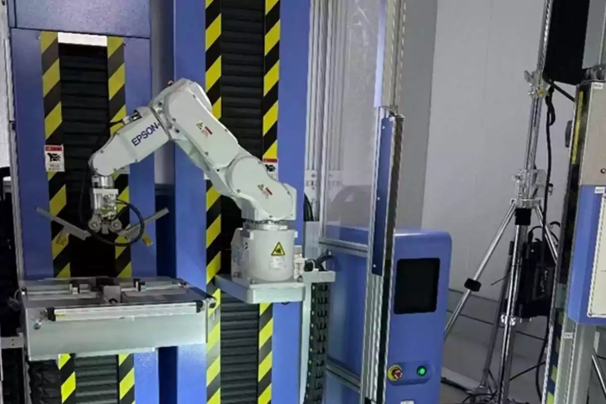 Industrial robotic arm performing an automated task in a laboratory environment with safety equipment and specialized machinery Industrial robotic arm performing an automated task in a laboratory environment with safety equipment and specialized machinery