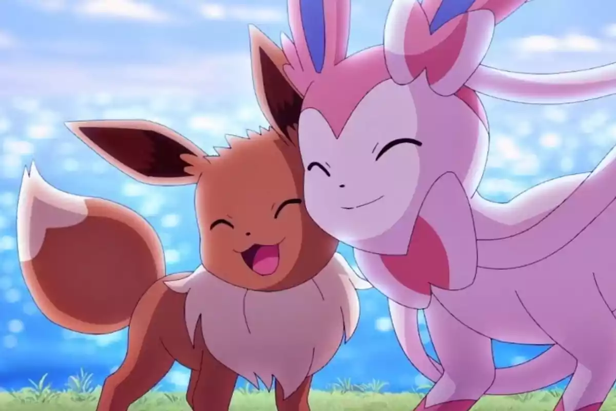 Eevee and Sylveon smile happily together outdoors by a sparkling lake.