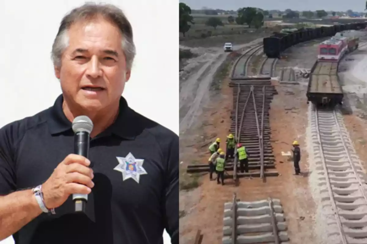 A man in a black jersey with a microphone next to an image of workers building railroad tracks