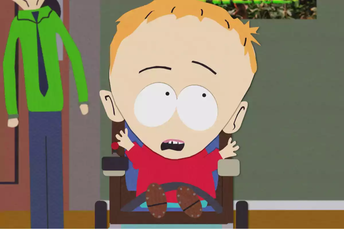 Animated character with light blonde hair and a red jersey sitting in a wheelchair with arms raised inside a room Animated character with light blonde hair and a red jersey sitting in a wheelchair with arms raised inside a room
