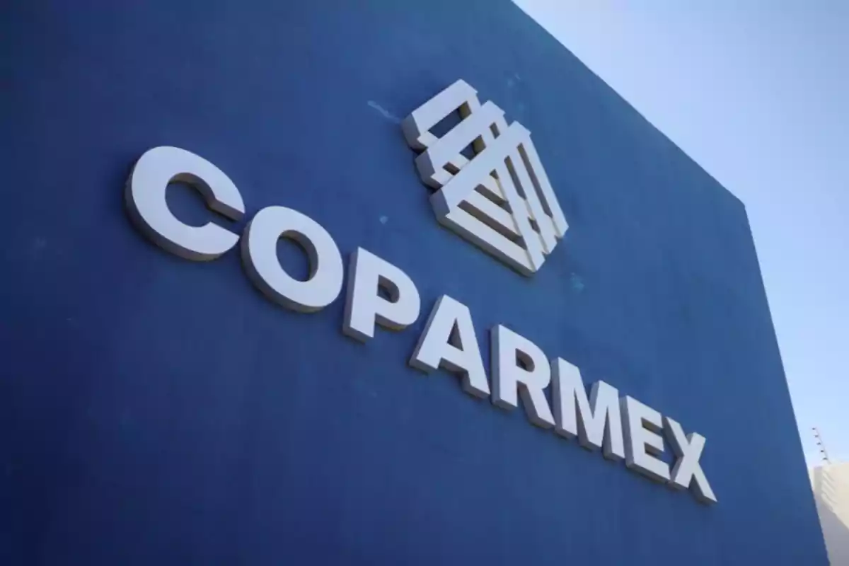Blue building with the COPARMEX logo and white letters on the facade Blue building with the COPARMEX logo and white letters on the facade