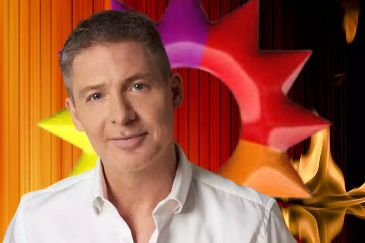 Short-haired, gray-haired man wearing a white jersey posing in front of a colorful background with a star shape and flames.
