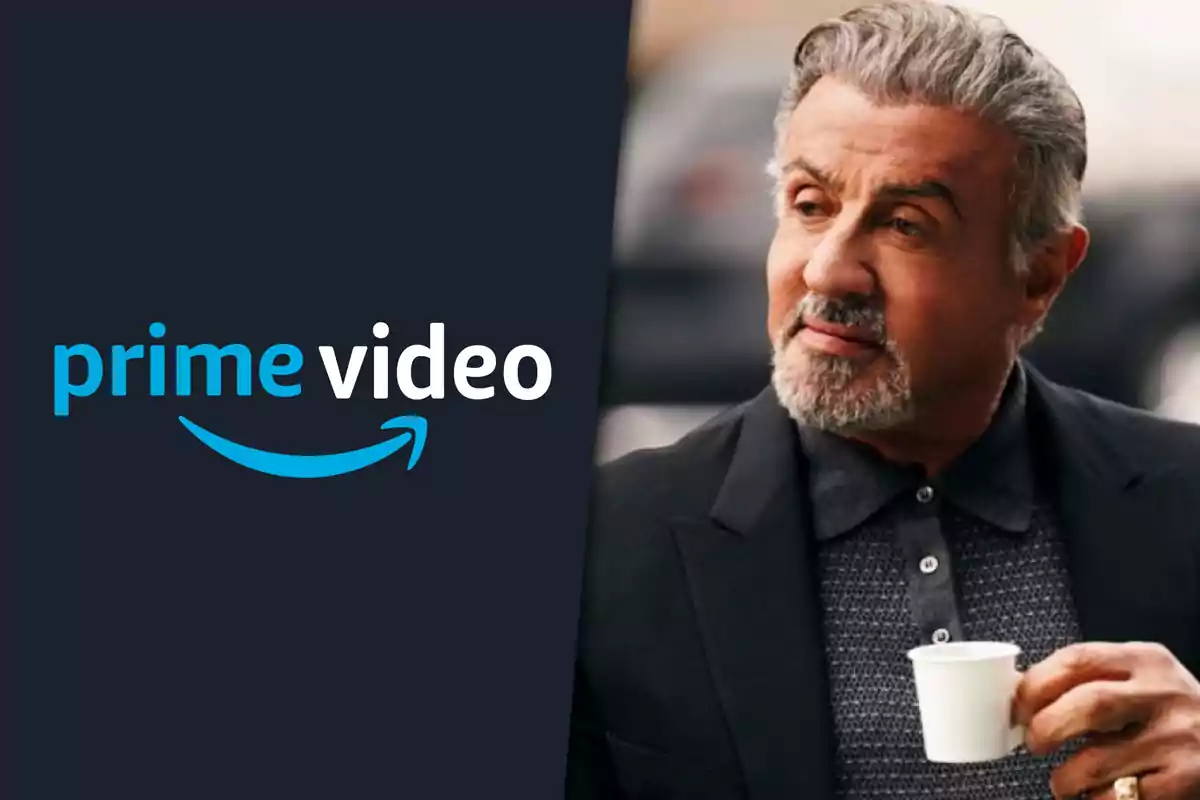 Gray-haired man holding a small cup next to the Prime Video logo on a dark background
