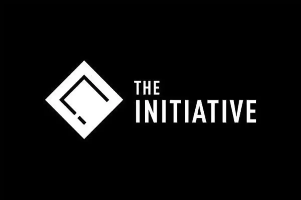 The Initiative logo with a black background and a white geometric design to the left of the text The Initiative logo with a black background and a white geometric design to the left of the text