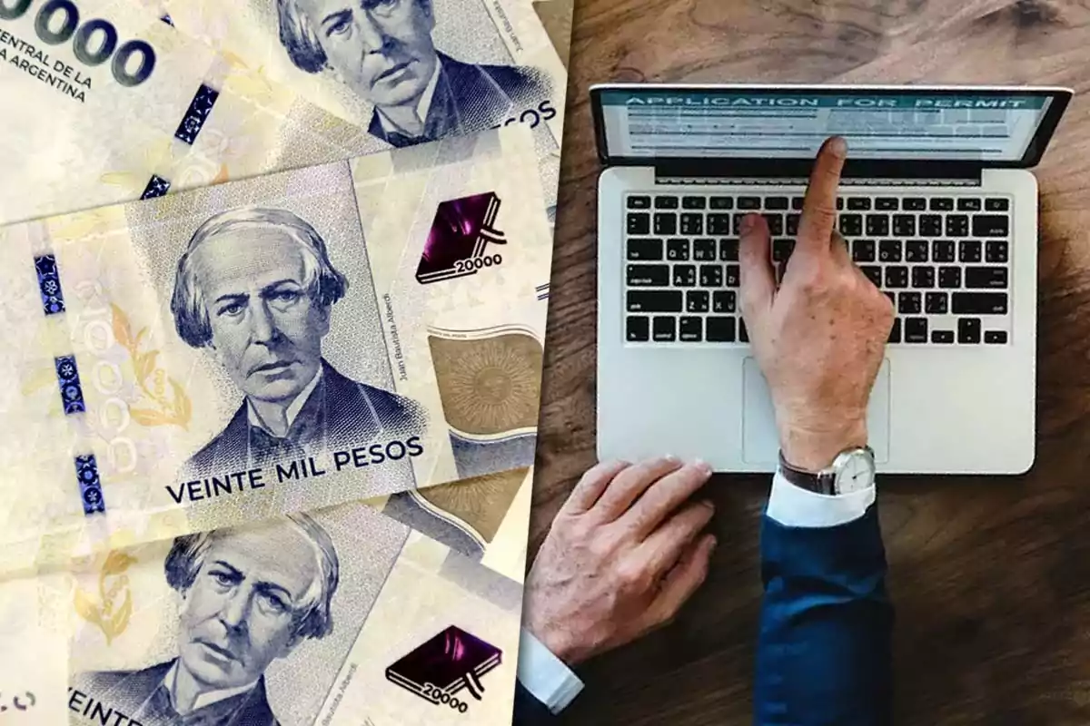 Twenty-thousand Argentine peso bills next to a person using a laptop