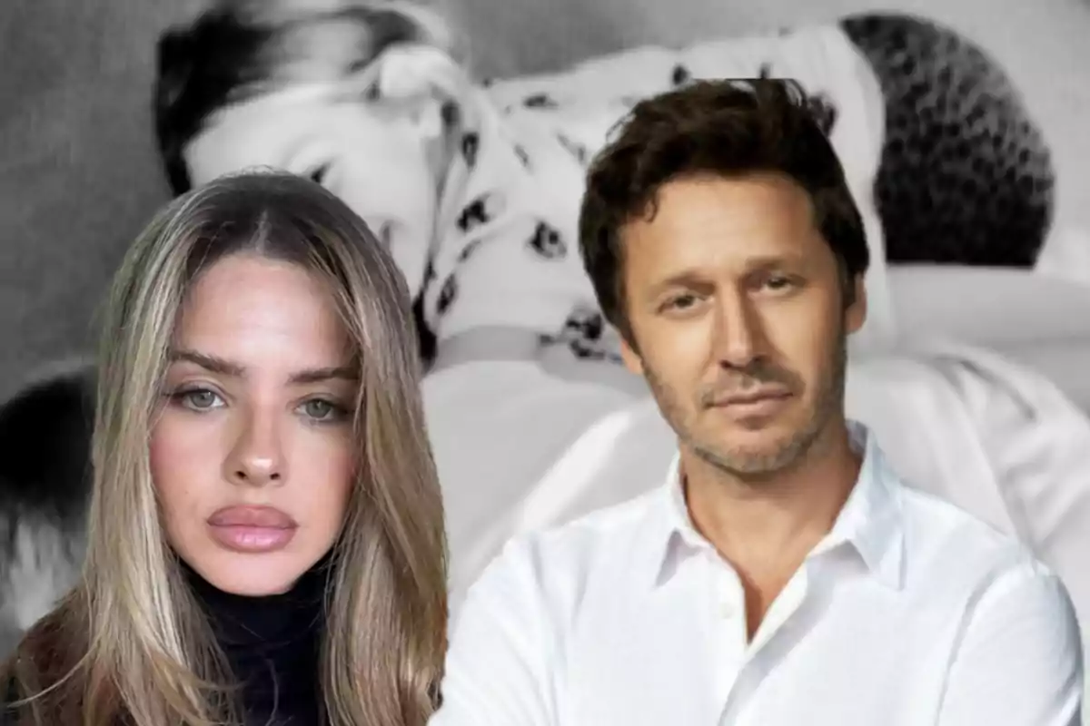 A blonde-haired woman and a brown-haired man pose together in front of a blurred black-and-white image.