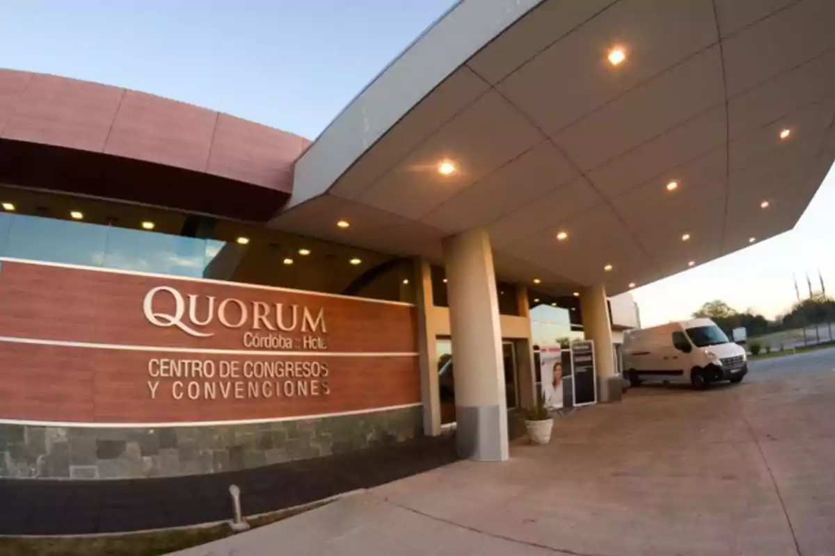Main entrance of the Quorum Hotel Córdoba Convention and Conference Center with a white van parked and lights on the exterior roof Main entrance of the Quorum Hotel Córdoba Convention and Conference Center with a white van parked and lights on the exterior roof