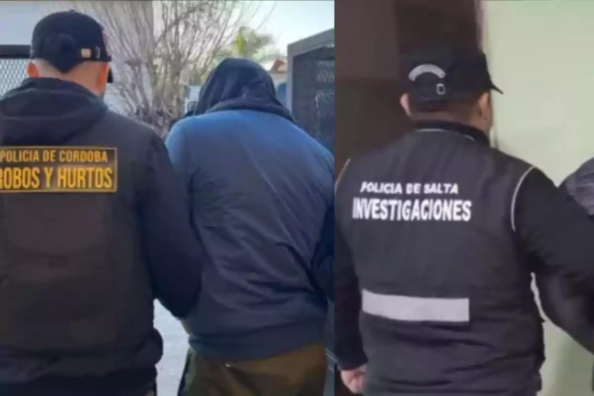 Dos policías de espaldas escoltan a personas detenidas, uno con chaleco de la policía de Córdoba y otro de la policía de Salta
