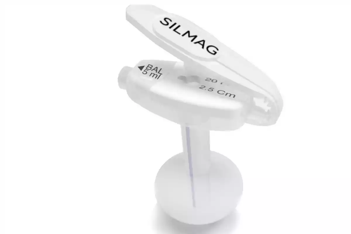 White plastic medical device with the SILMAG brand and specifications printed on the surface White plastic medical device with the SILMAG brand and specifications printed on the surface