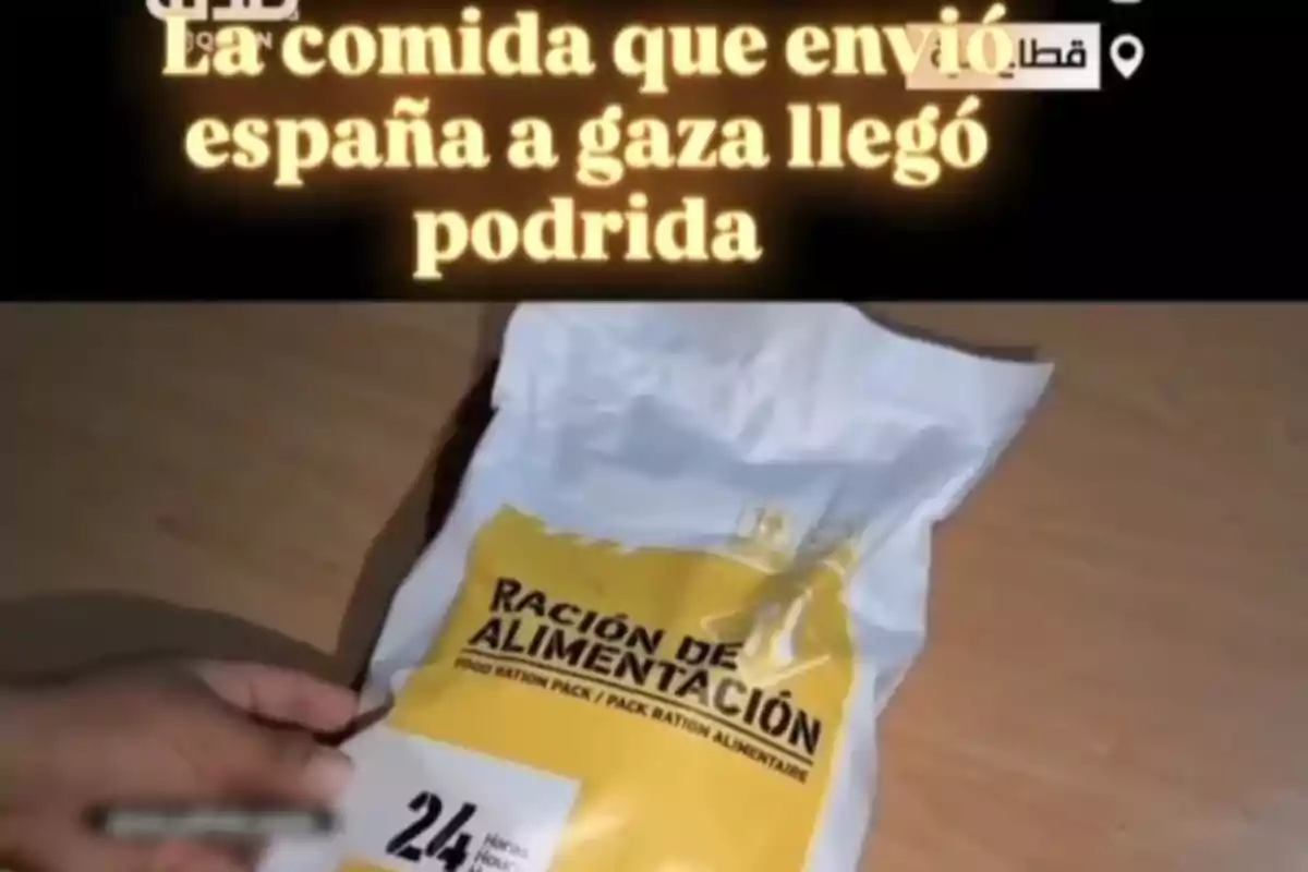 A food ration pack on a table with text at the top saying that the food sent from Spain to Gaza arrived in poor condition A food ration pack on a table with text at the top saying that the food sent from Spain to Gaza arrived in poor condition
