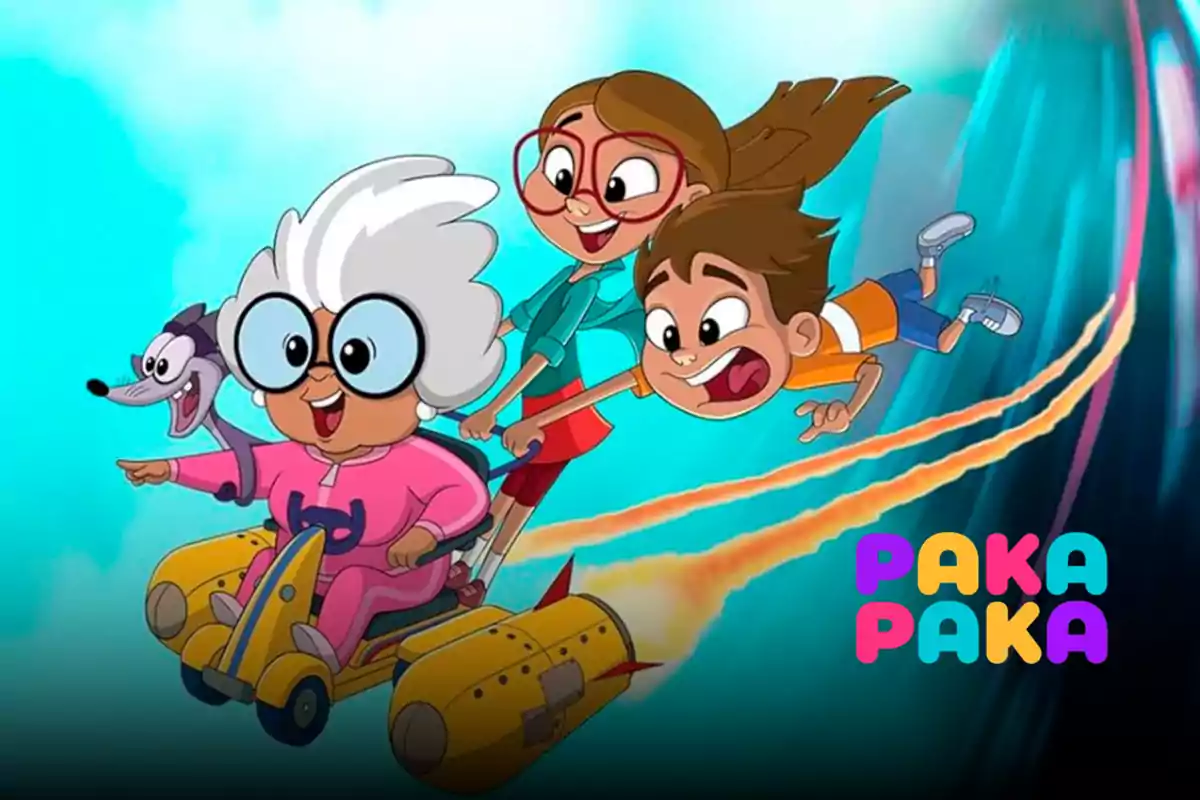 Three animated characters and a dog travel at high speed in a yellow flying vehicle while smiling and enjoying the adventure, with the Paka Paka logo in the bottom right corner.
