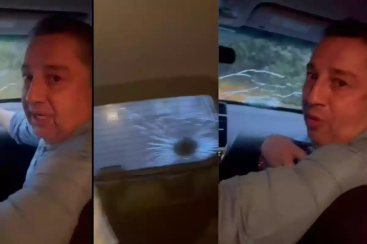 Hombre dentro de un automóvil con ventanas dañadas y un impacto visible en el parabrisas trasero