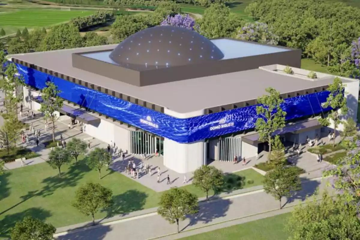 Modern building with a central dome and blue facade, surrounded by green areas and people walking around