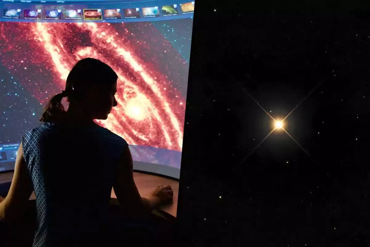 A person looks at an image of a galaxy on a screen while to the right a bright star is shown in space surrounded by smaller stars.