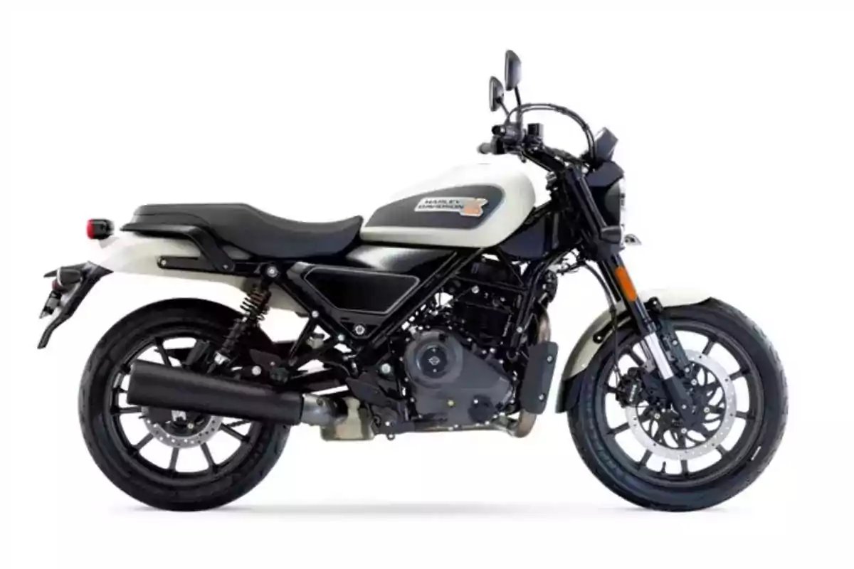 White Harley-Davidson motorcycle with black details, side view on a white background White Harley-Davidson motorcycle with black details, side view on a white background
