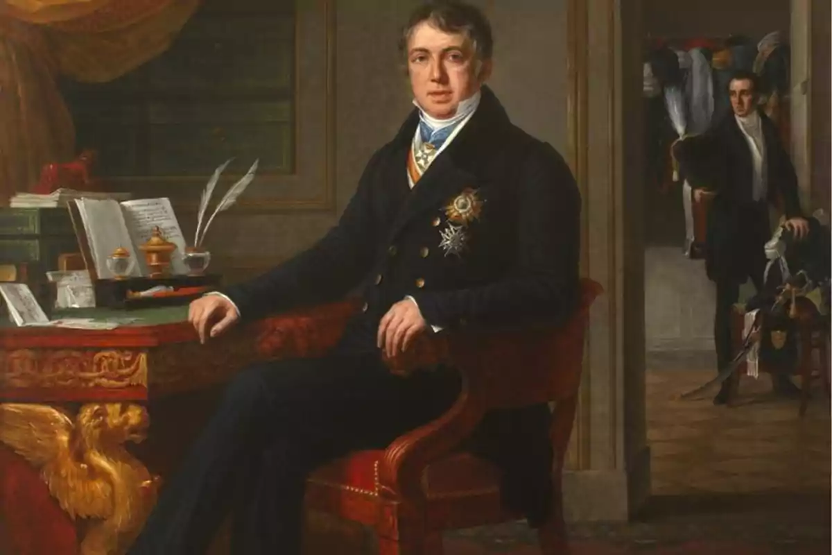 Elegantly dressed man sitting at an antique desk with books and quills, while another person appears in the background in an adjoining room. Elegantly dressed man sitting at an antique desk with books and quills, while another person appears in the background in an adjoining room.