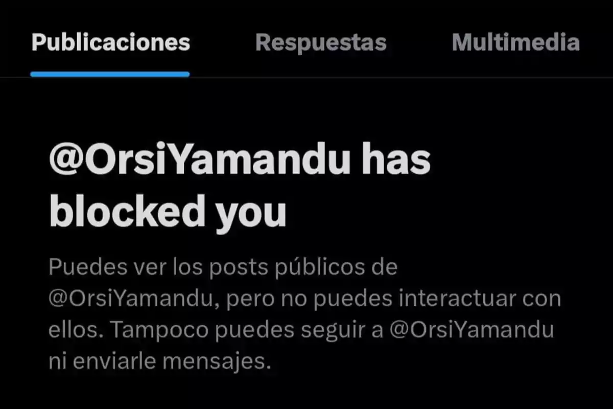 Captura de pantalla de Twitter mostrando un mensaje que indica que el usuario @OrsiYamandu te ha bloqueado y no puedes interactuar con su cuenta Captura de pantalla de Twitter mostrando un mensaje que indica que el usuario @OrsiYamandu te ha bloqueado y no puedes interactuar con su cuenta