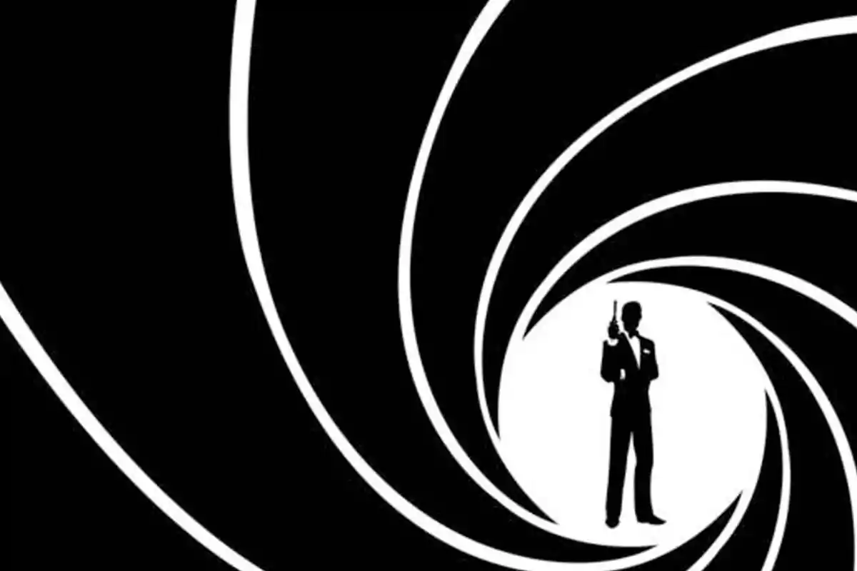 Silhouette of a man in a tuxedo with a gun at the center of a black and white spiral design Silhouette of a man in a tuxedo with a gun at the center of a black and white spiral design