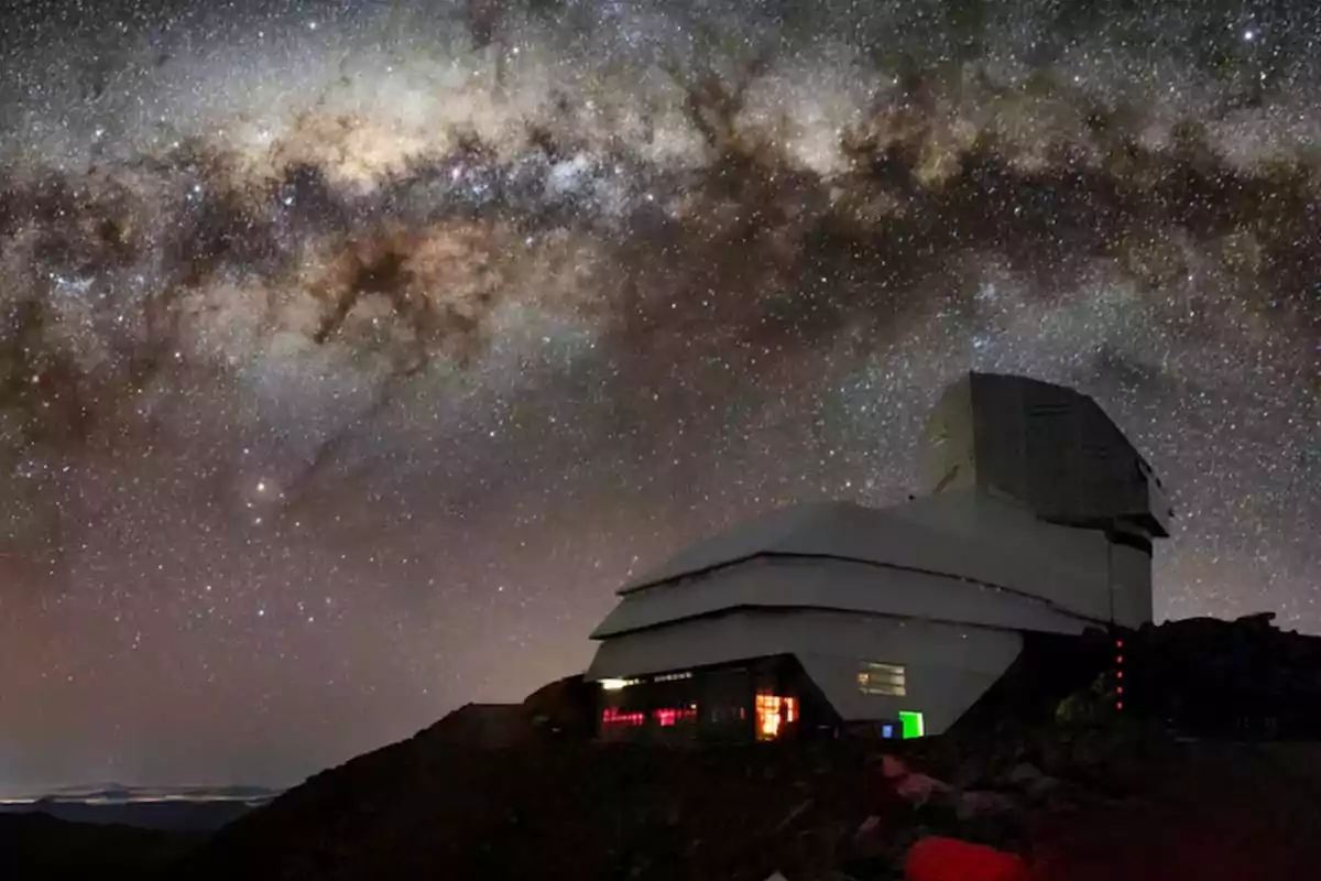 Astronomical observatory under a starry night sky with the Milky Way visible Astronomical observatory under a starry night sky with the Milky Way visible