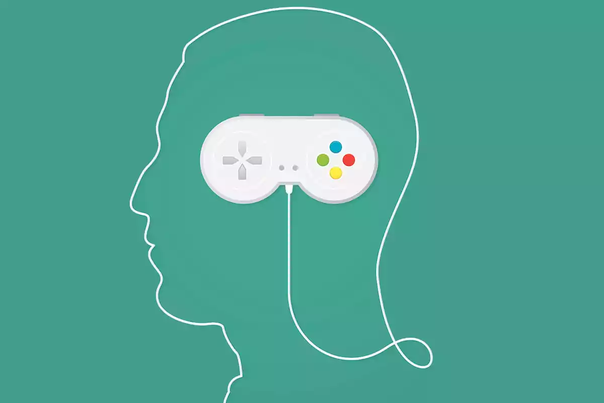 Silhouette of a human head formed by the cable of a video game controller, with the controller located in the brain area against a green background Silhouette of a human head formed by the cable of a video game controller, with the controller located in the brain area against a green background