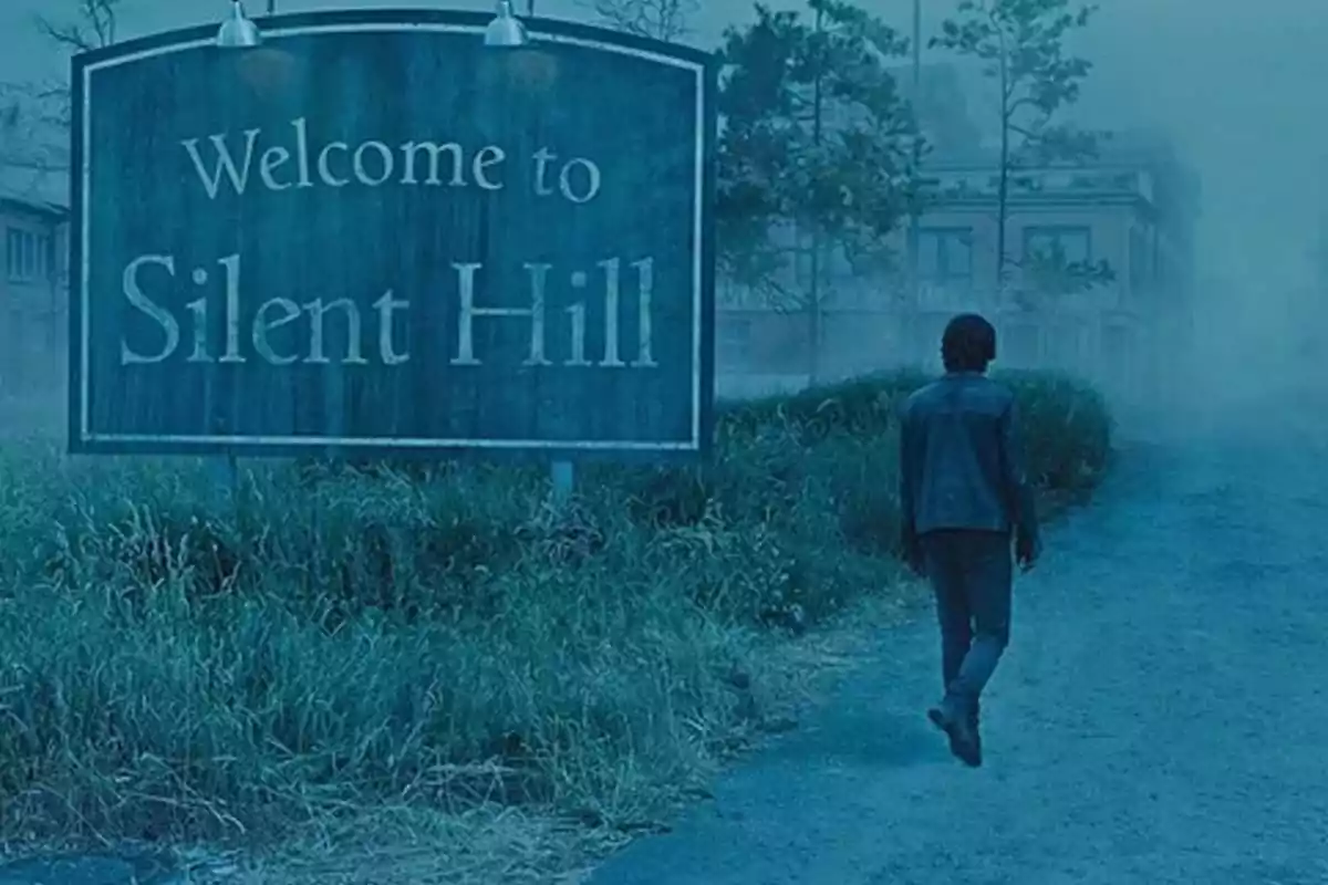 Person walking toward a large sign that says Welcome to Silent Hill in a dark and foggy environment Person walking toward a large sign that says Welcome to Silent Hill in a dark and foggy environment