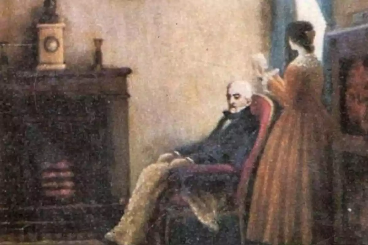 An elderly man is sitting in a chair by a fireplace while a woman stands next to him reading a book.